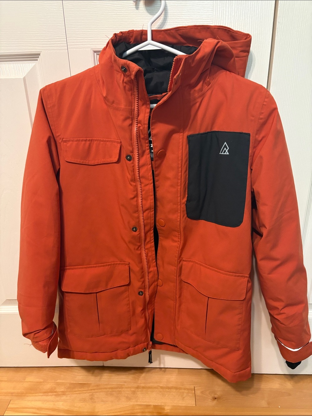 Kids Orange Hooded Ski Jacket with Contrasting Black Chest Pocket